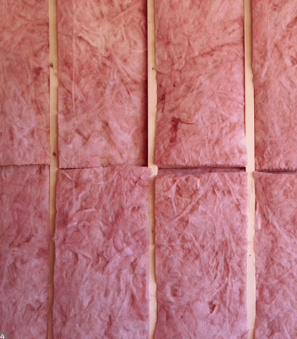 Insulation batts installed between wall studs